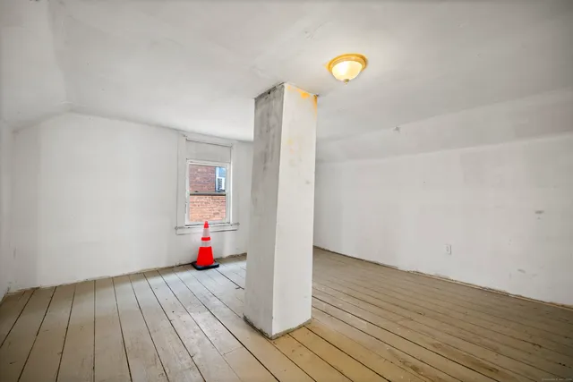 a view of wooden floor and living room