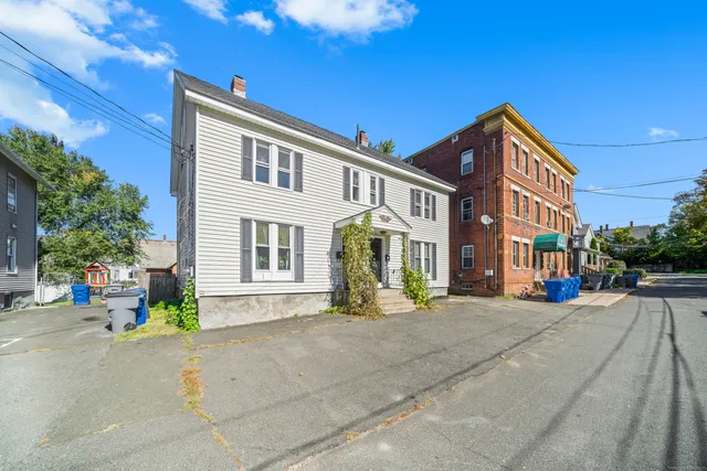 a view of a building with a street