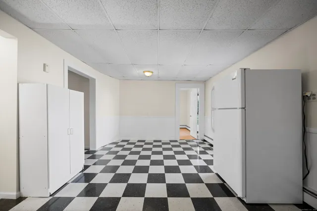 a black and white checkered floor with a black white checkered floor