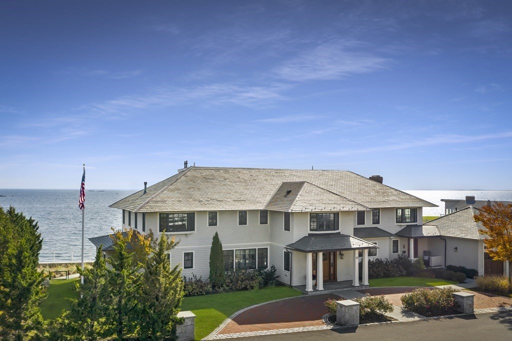 15 Spray Avenue Marblehead, MA 01945 - Photo 1 of 42 a front view of a house with a garden