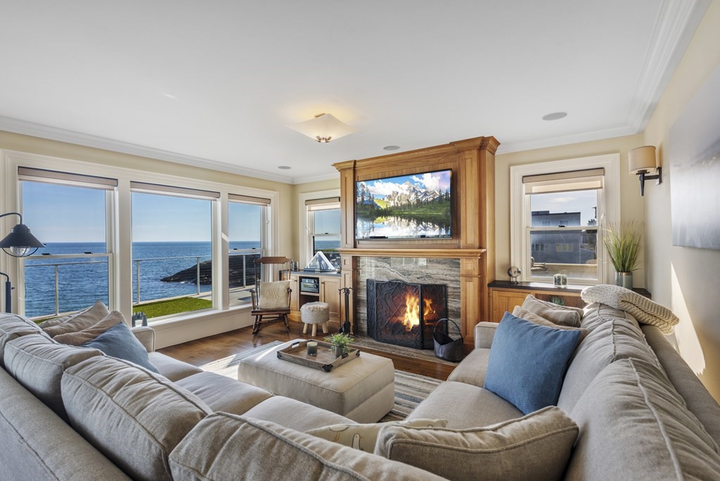 15 Spray Avenue Marblehead, MA 01945 - Photo 17 of 42 a living room with furniture and a fireplace