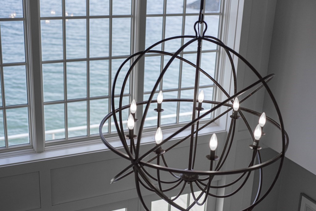 15 Spray Avenue Marblehead, MA 01945 - Photo 26 of 42 a view of staircase with a metal railing and a window