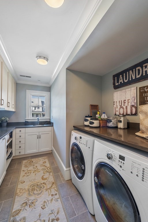 15 Spray Avenue Marblehead, MA 01945 - Photo 33 of 42 a kitchen with granite countertop a sink a stove and cabinets