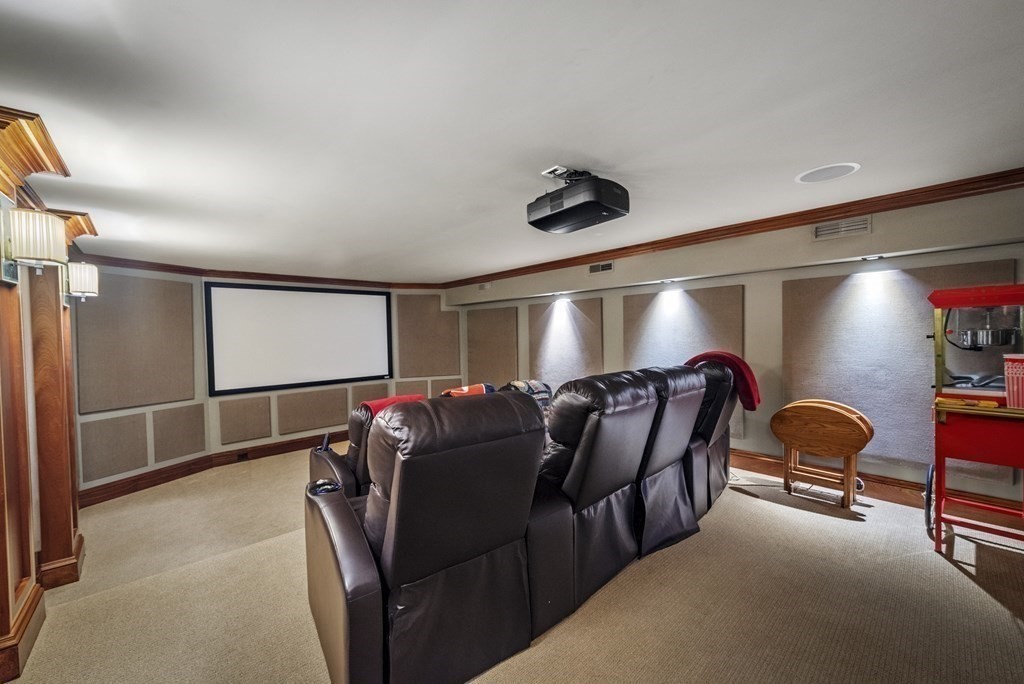 15 Spray Avenue Marblehead, MA 01945 - Photo 41 of 42 a projector room with furniture and a ceiling fan