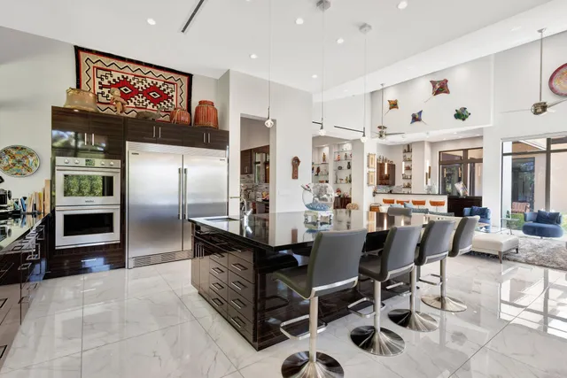 a kitchen with a large window in it