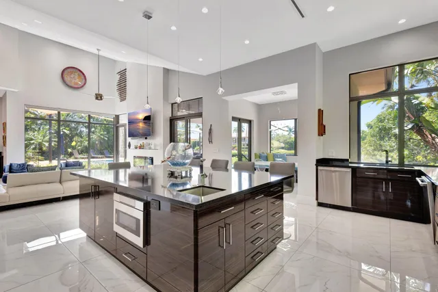 a dining room with wooden floor and furniture