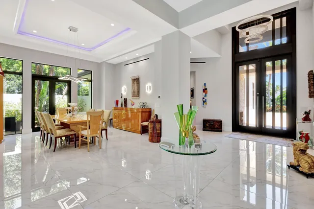 a kitchen with stainless steel appliances granite countertop a stove and a sink