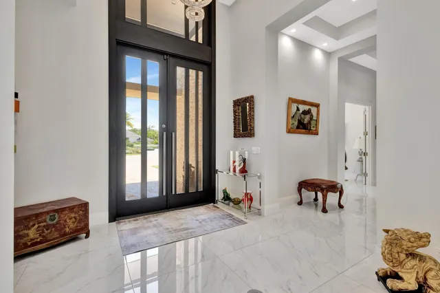 a living room with furniture fireplace and flat screen tv