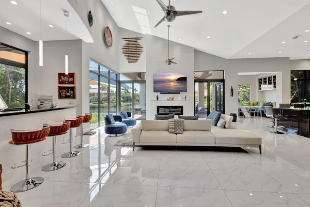 a view of living room with furniture and flat screen tv
