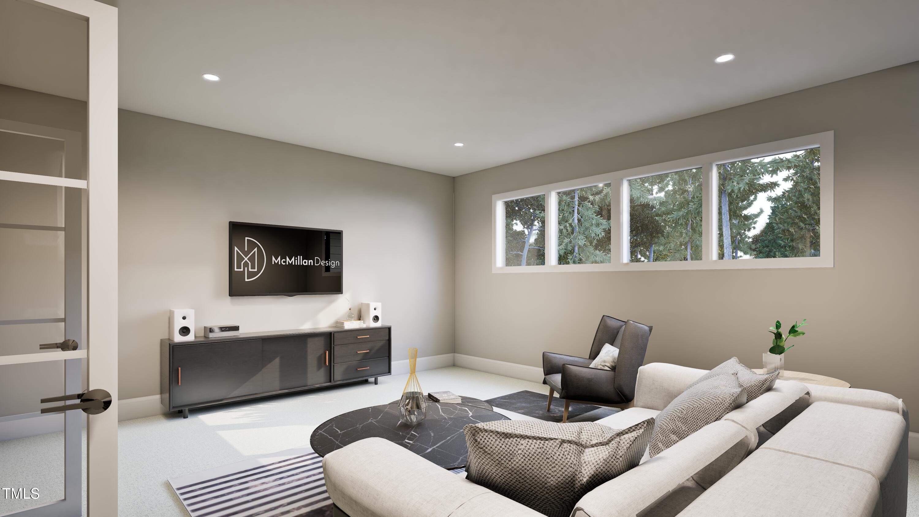 5428 Winding View Lane Raleigh, NC 27615 - Photo 15 of 24 a living room with furniture and a flat screen tv