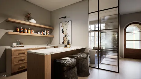 a kitchen with a sink appliances and a window