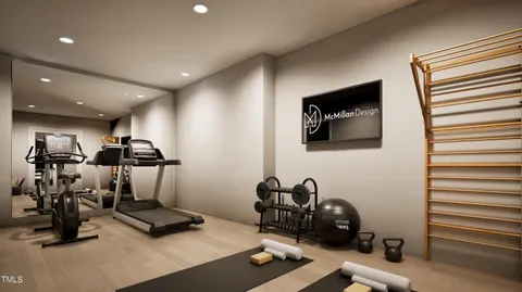 a kitchen with kitchen island a dining table chairs cabinets and stainless steel appliances