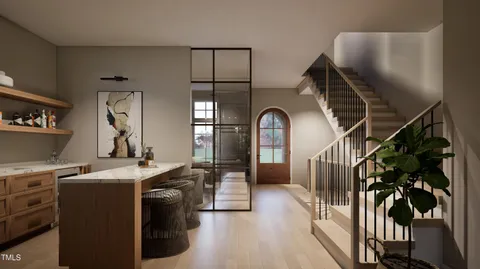 a living room with furniture kitchen view and a large window