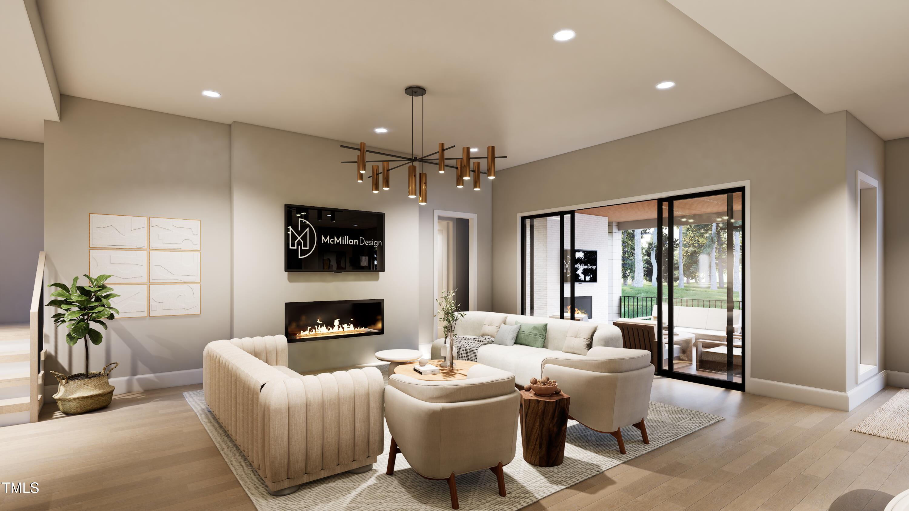 5428 Winding View Lane Raleigh, NC 27615 - Photo 5 of 24 a living room with furniture a fireplace and a chandelier