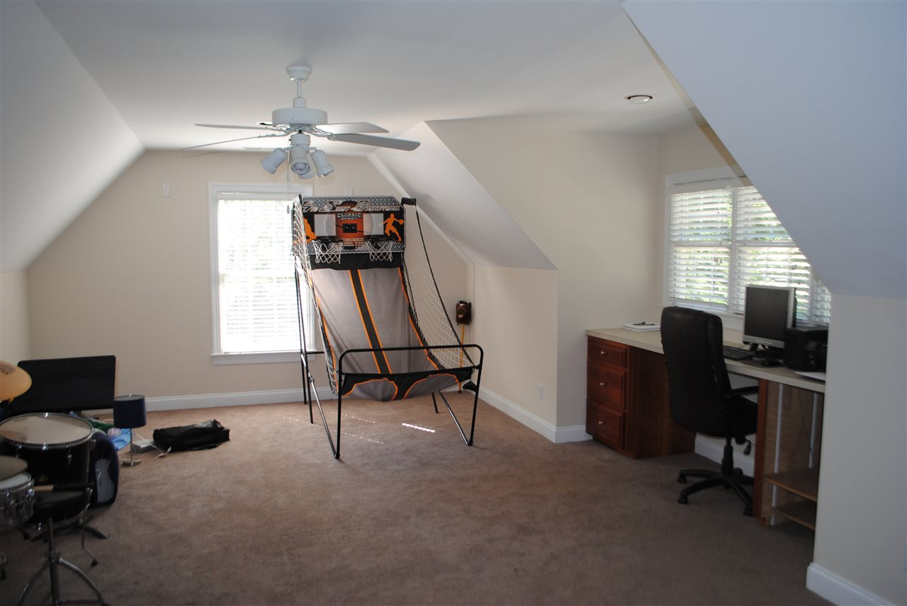 7032 Trenton Ridge Court Raleigh, NC 27613 - Photo 25 of 25 Very Large Second Floor Playroom/game room.