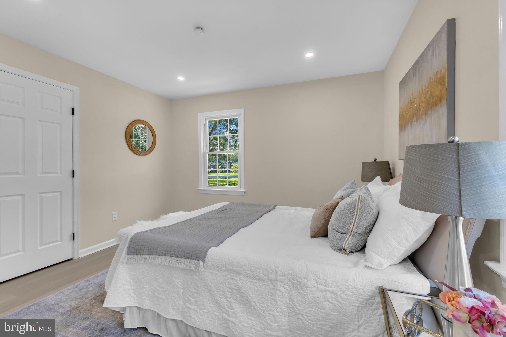 6400 Inwood Drive Springfield, VA 22150 - Photo 18 of 37 a bedroom with a bed and a window