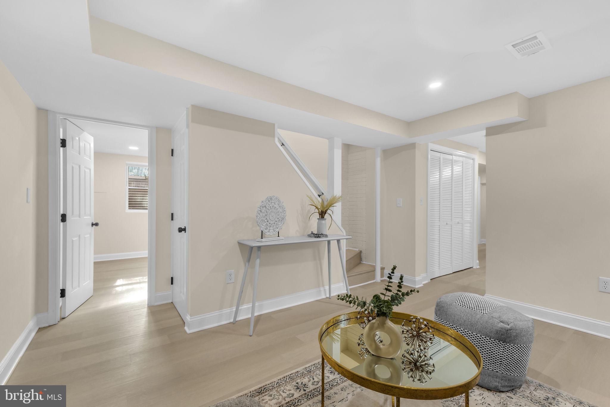 6400 Inwood Drive Springfield, VA 22150 - Photo 25 of 37 a living room with furniture and a dining table