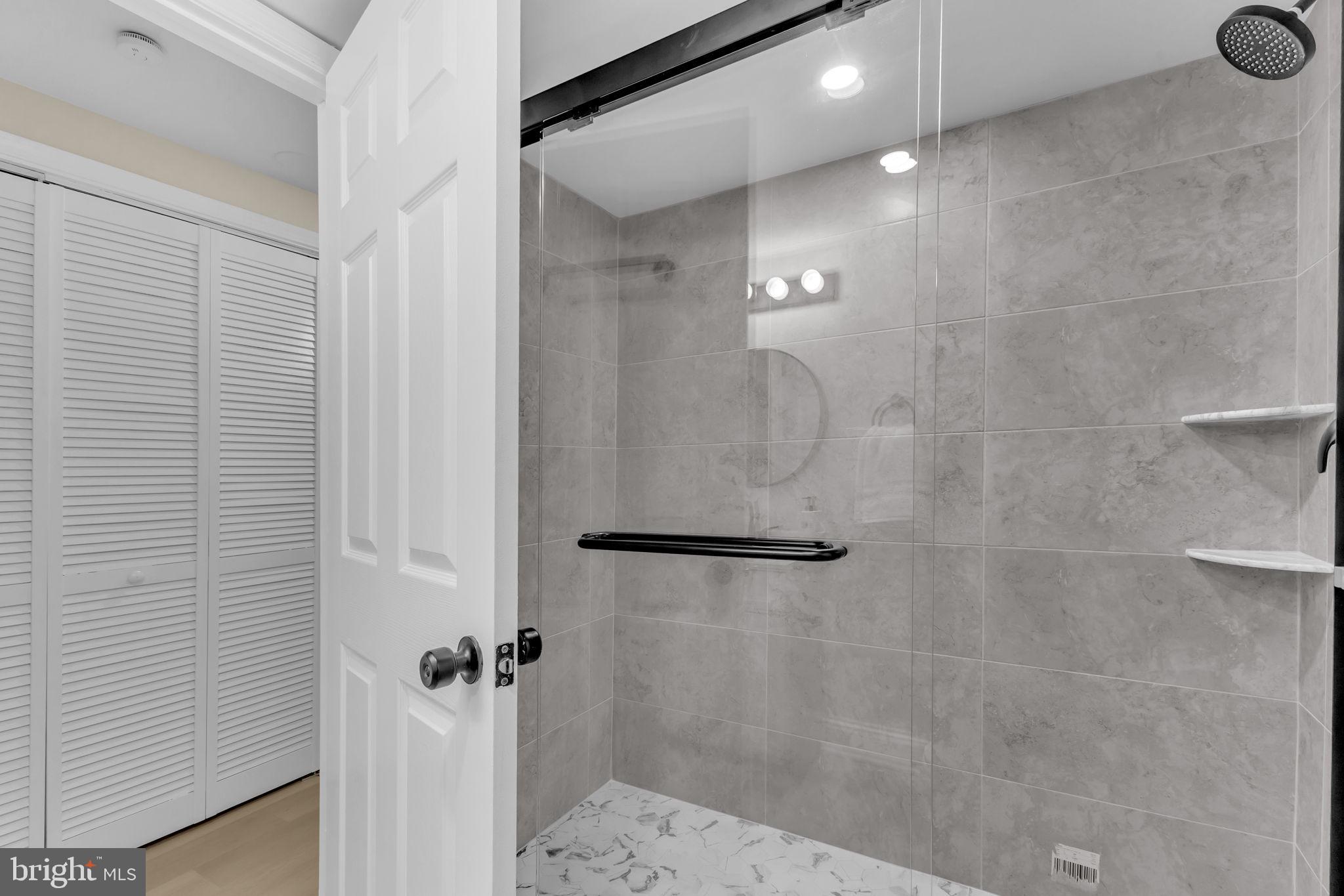 6400 Inwood Drive Springfield, VA 22150 - Photo 29 of 37 a bathroom with a shower