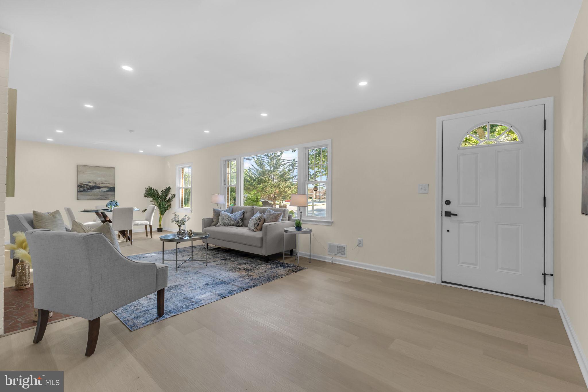 6400 Inwood Drive Springfield, VA 22150 - Photo 4 of 37 a living room with furniture and a couch