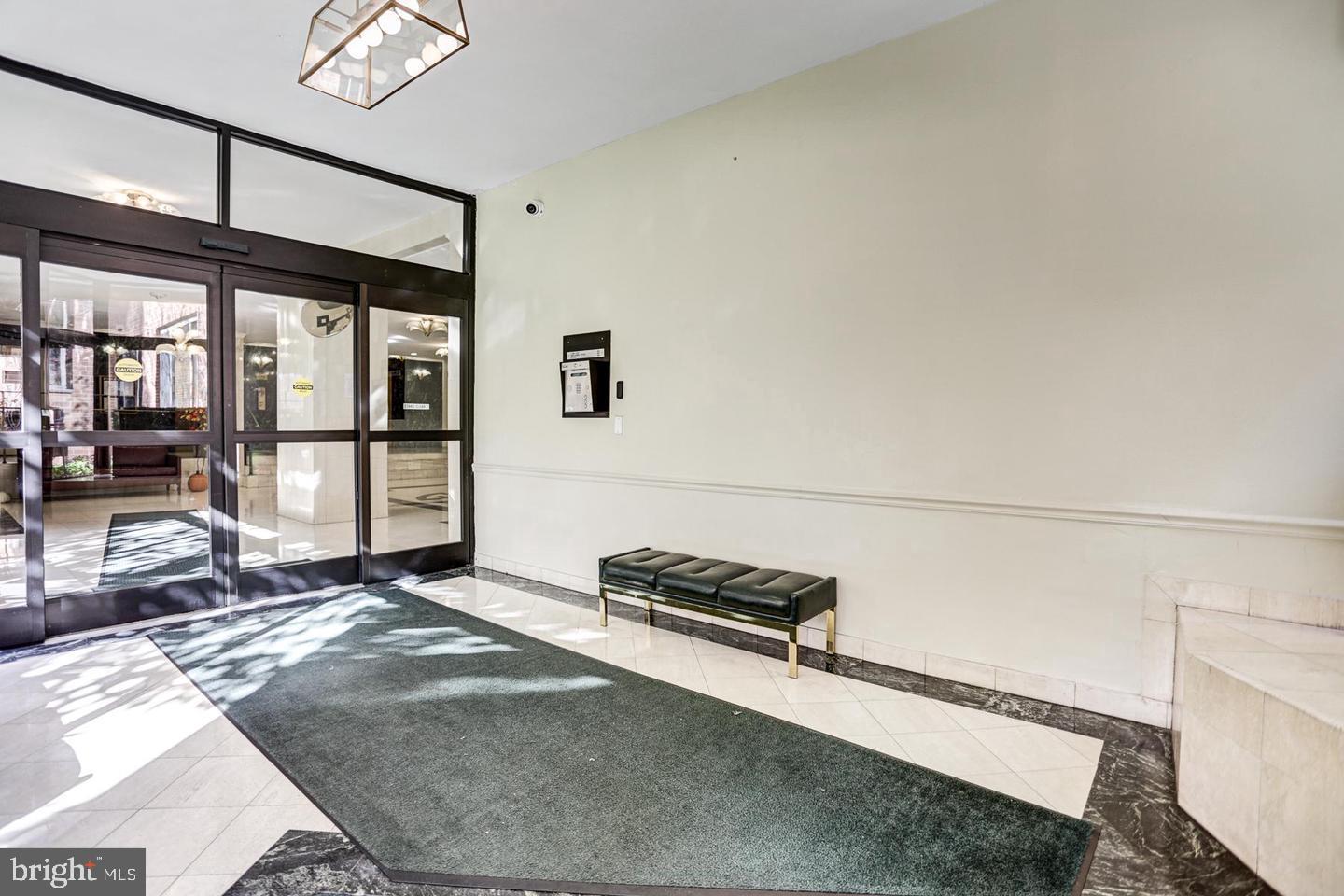 1121 Arlington Boulevard, Unit 218 Arlington, VA 22209 - Photo 14 of 32 a view of a livingroom with furniture and a window