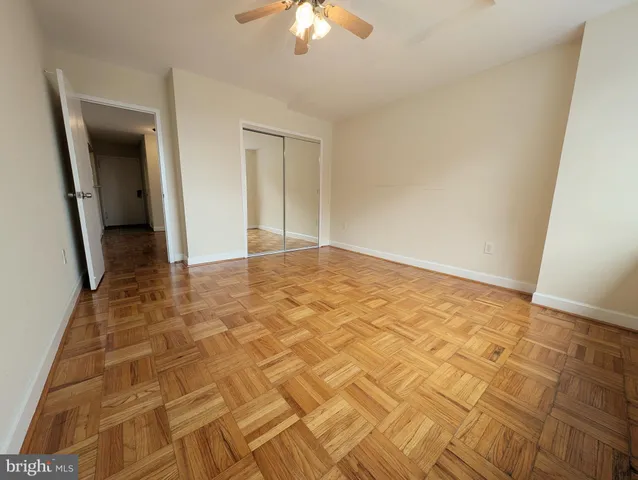 a view of an empty room and window