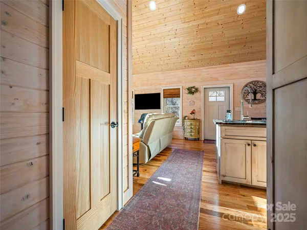 a hallway with cabinets