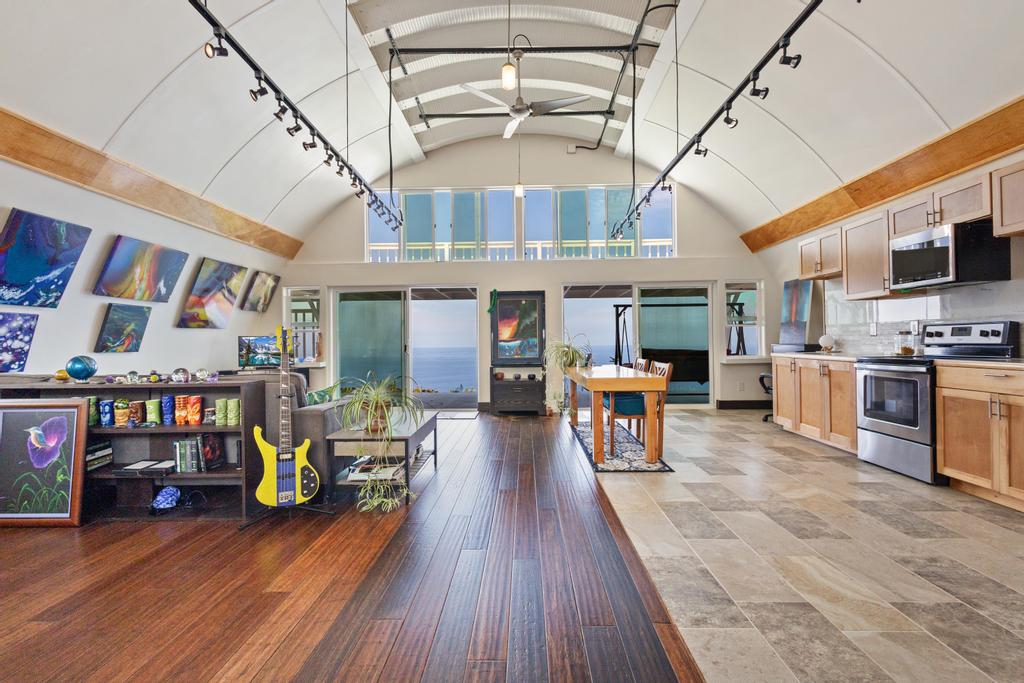 87-4521 Keahi Kai Place Captain Cook, HI 96704 - Photo 2 of 22 a living room with furniture and a wooden floor