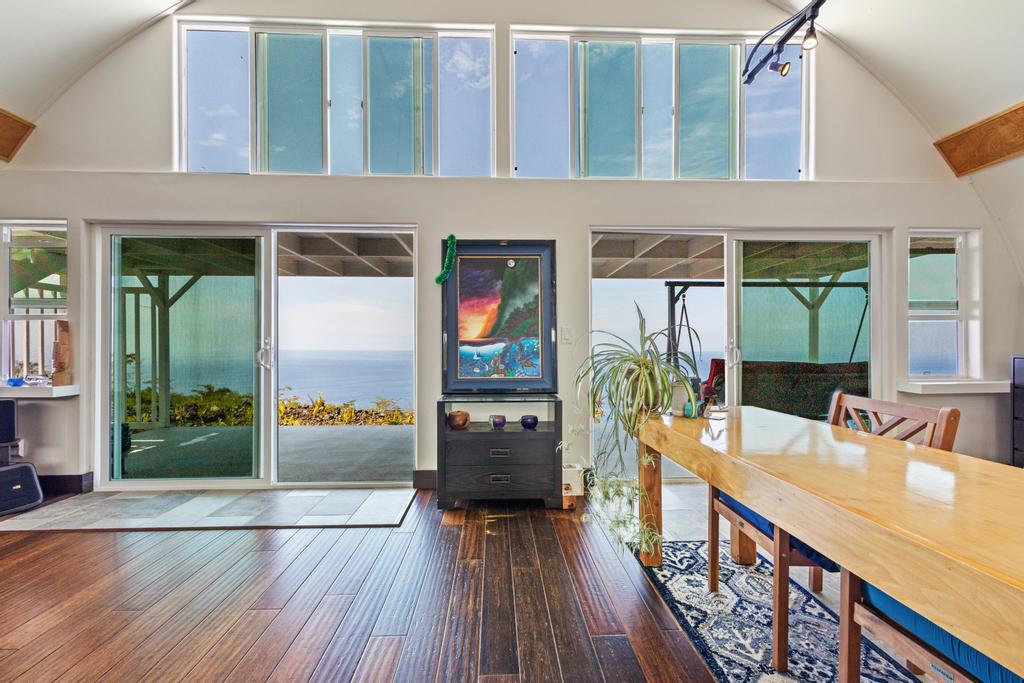 87-4521 Keahi Kai Place Captain Cook, HI 96704 - Photo 22 of 22 a view of a balcony with furniture and wooden floor