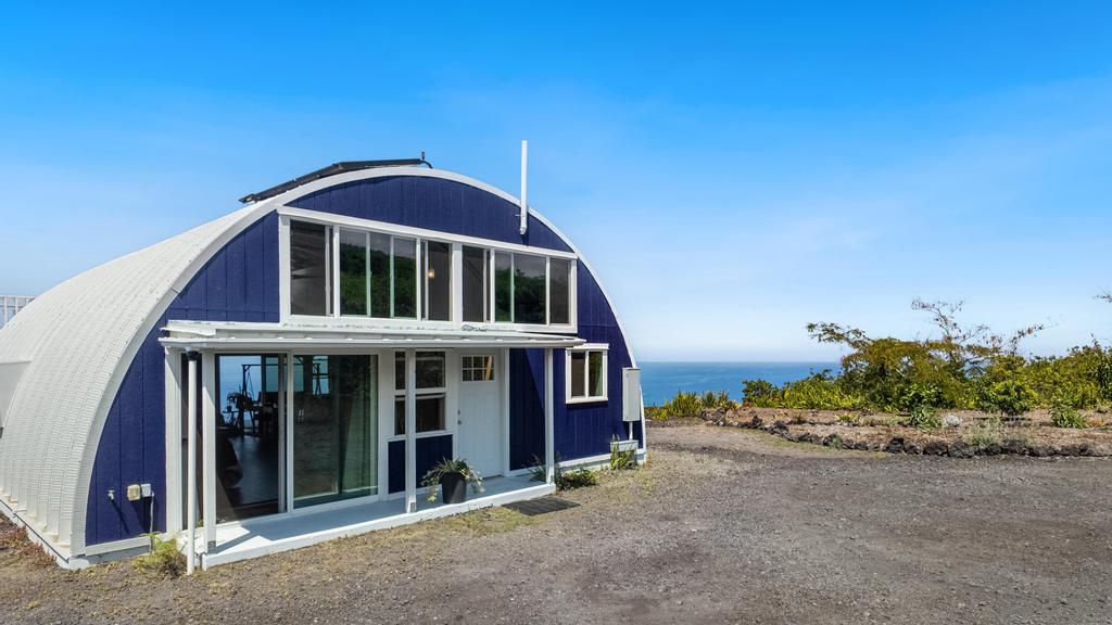 87-4521 Keahi Kai Place Captain Cook, HI 96704 - Photo 5 of 22 a front view of a house with a yard