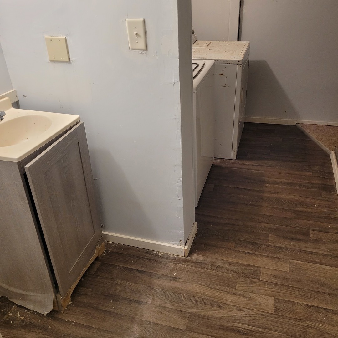 509 Lucier Street Murphysboro, IL 62966 - Photo 6 of 14 a view of a storage & utility room with wooden floor