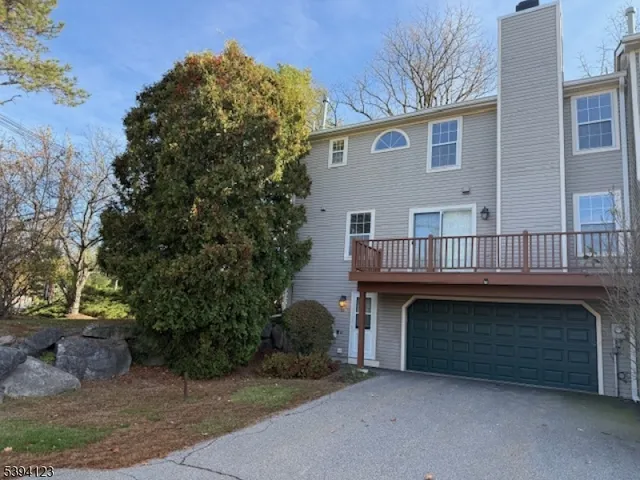 a view of house with outdoor space and entertaining space