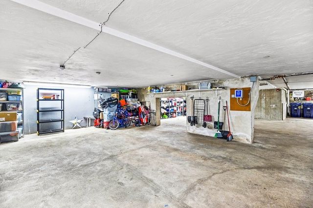 a garage with a car parked