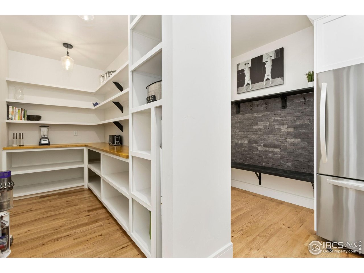 3802 Bridle Ridge Circle Severance, CO 80524 - Photo 17 of 50 a view of kitchen and utility room