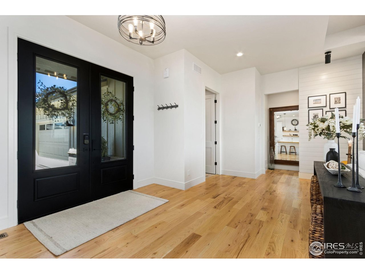 3802 Bridle Ridge Circle Severance, CO 80524 - Photo 2 of 50 a bedroom with a bed and a window