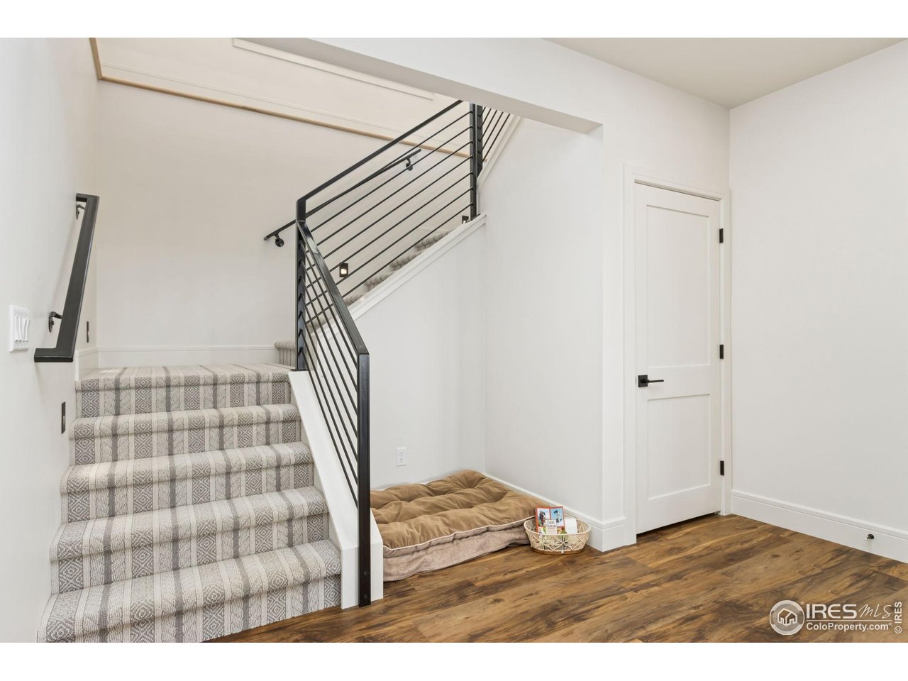 3802 Bridle Ridge Circle Severance, CO 80524 - Photo 28 of 50 a view of entryway with wooden floor