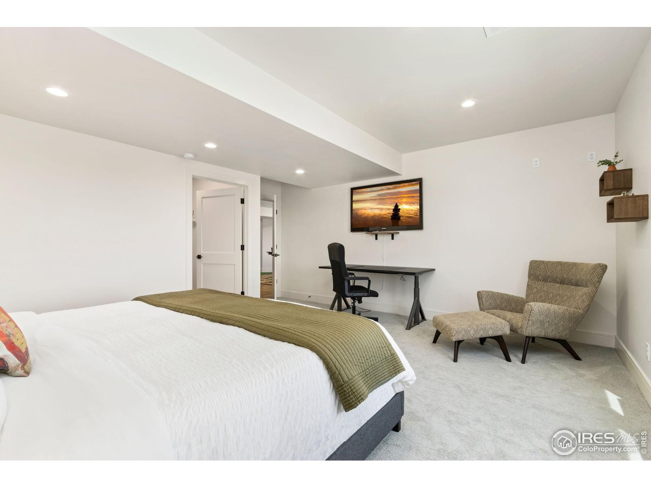 3802 Bridle Ridge Circle Severance, CO 80524 - Photo 36 of 50 a bed room with a bed and with furniture