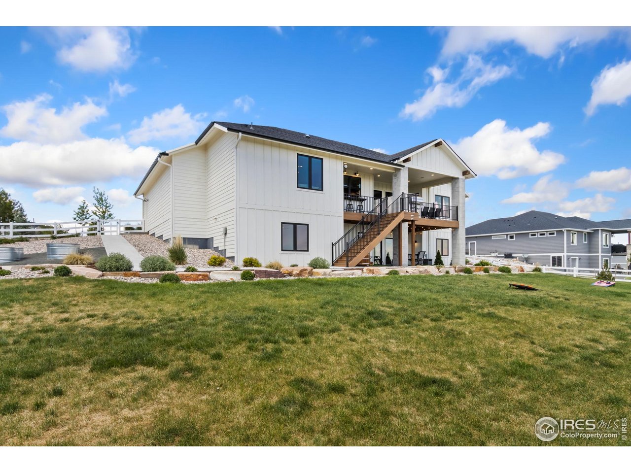 3802 Bridle Ridge Circle Severance, CO 80524 - Photo 50 of 50 a view of a house with a yard