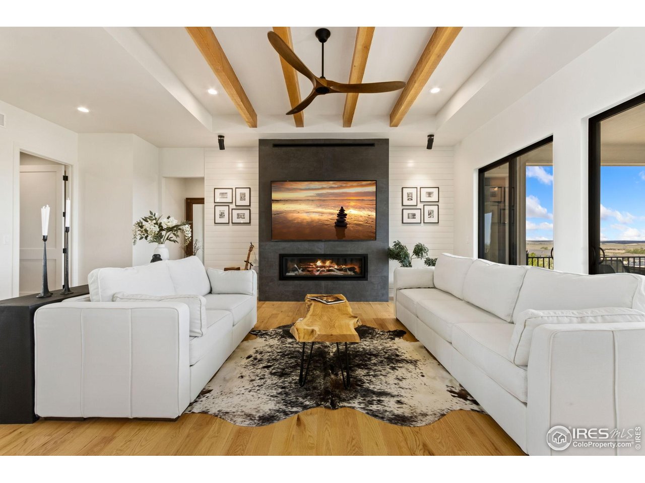 3802 Bridle Ridge Circle Severance, CO 80524 - Photo 5 of 50 a living room with furniture and a flat screen tv