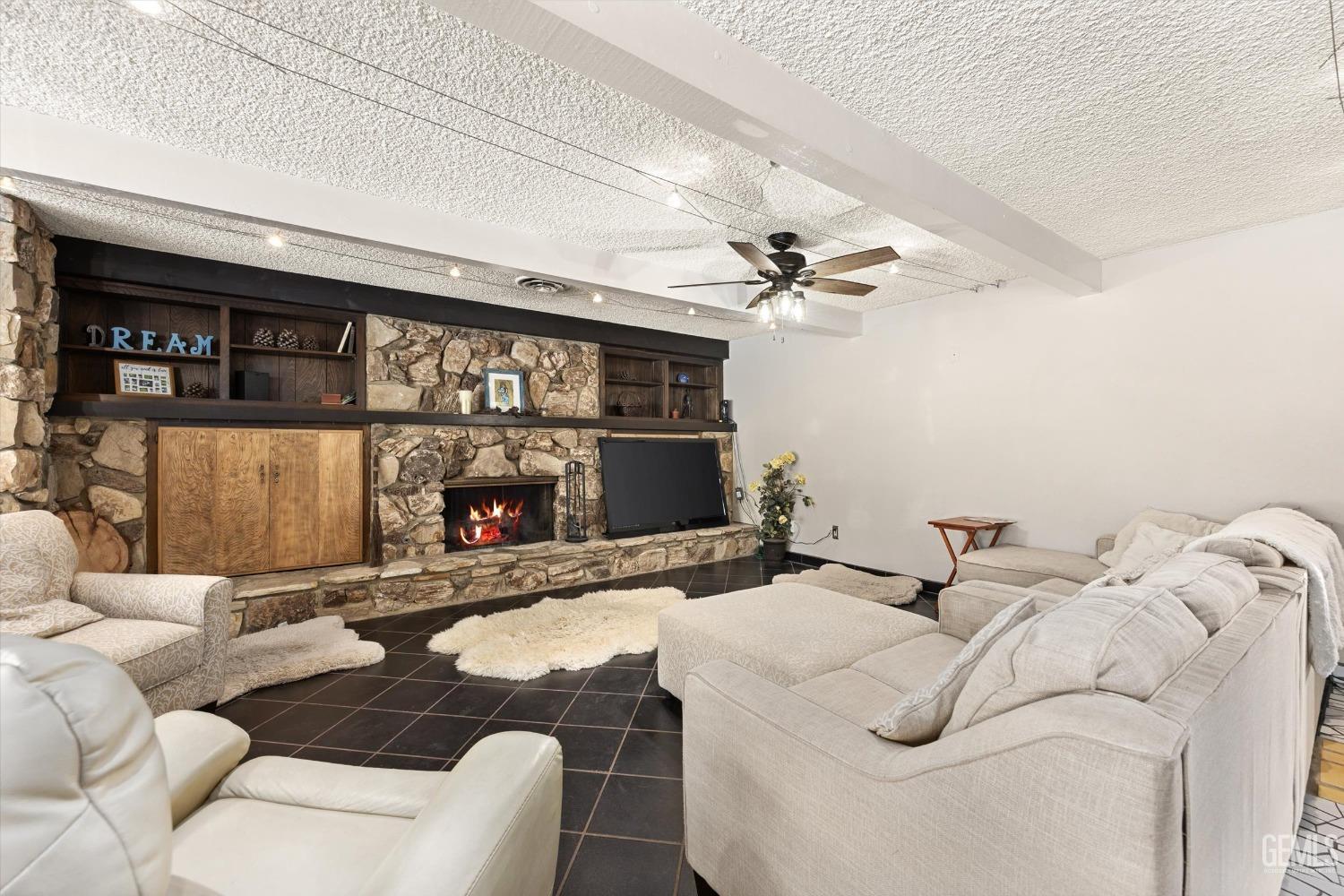 Undisclosed Address Bakersfield, CA 93306 - Photo 11 of 41 a living room with furniture and a window