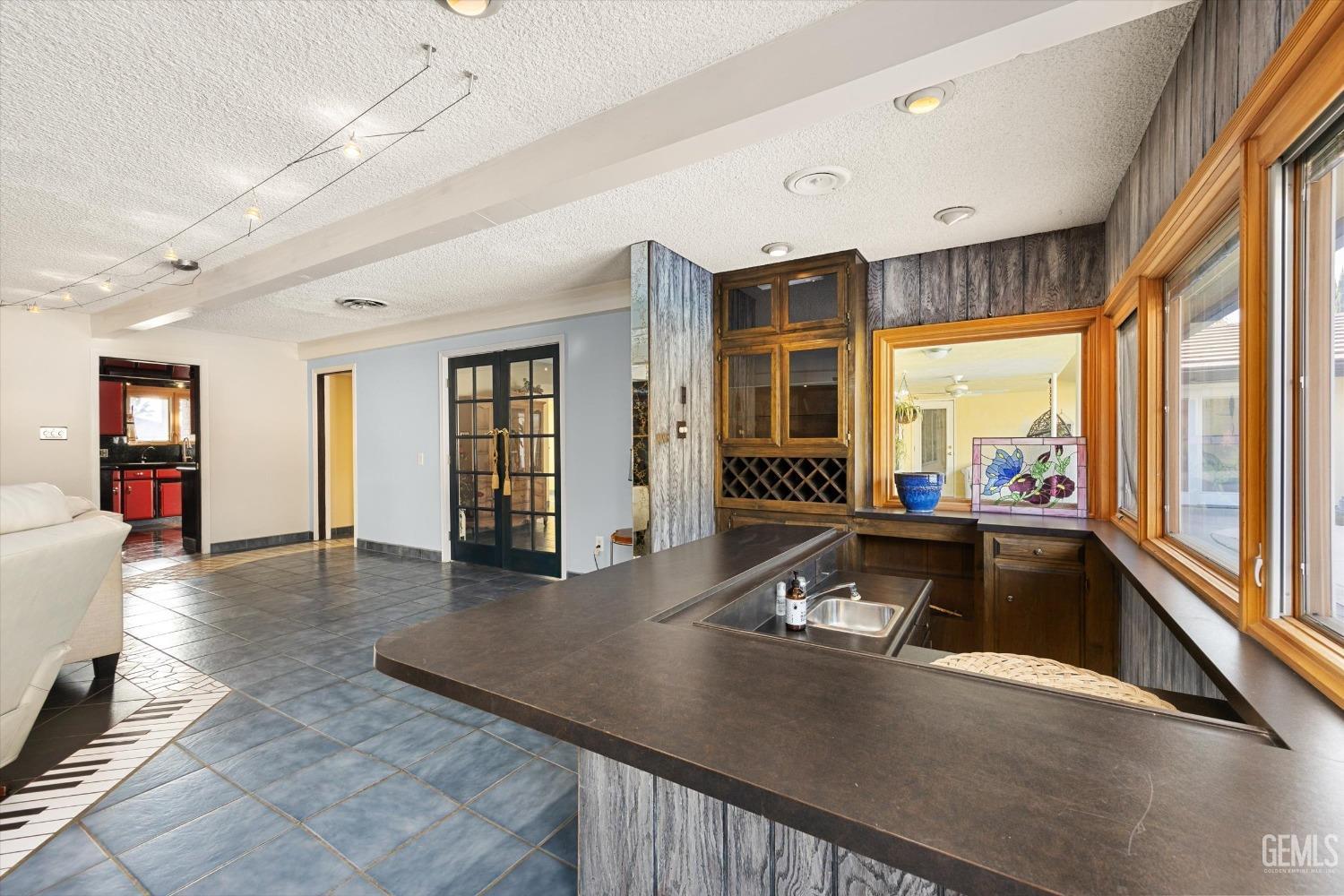 Undisclosed Address Bakersfield, CA 93306 - Photo 15 of 41 a living room with furniture and large window