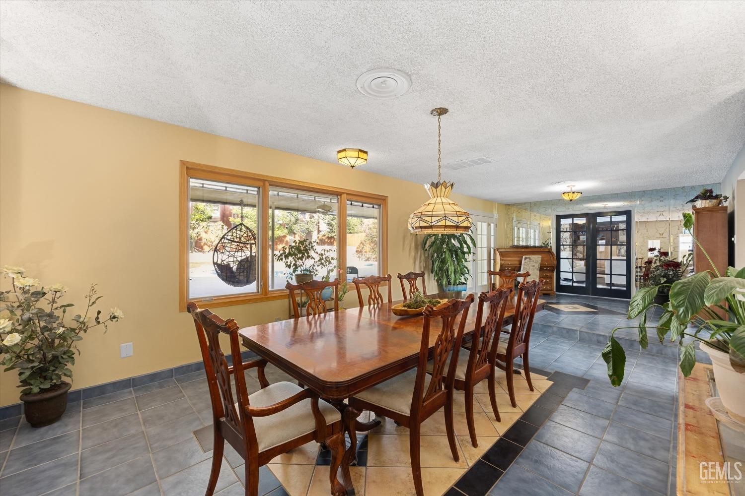 Undisclosed Address Bakersfield, CA 93306 - Photo 18 of 41 a dining room with furniture and window
