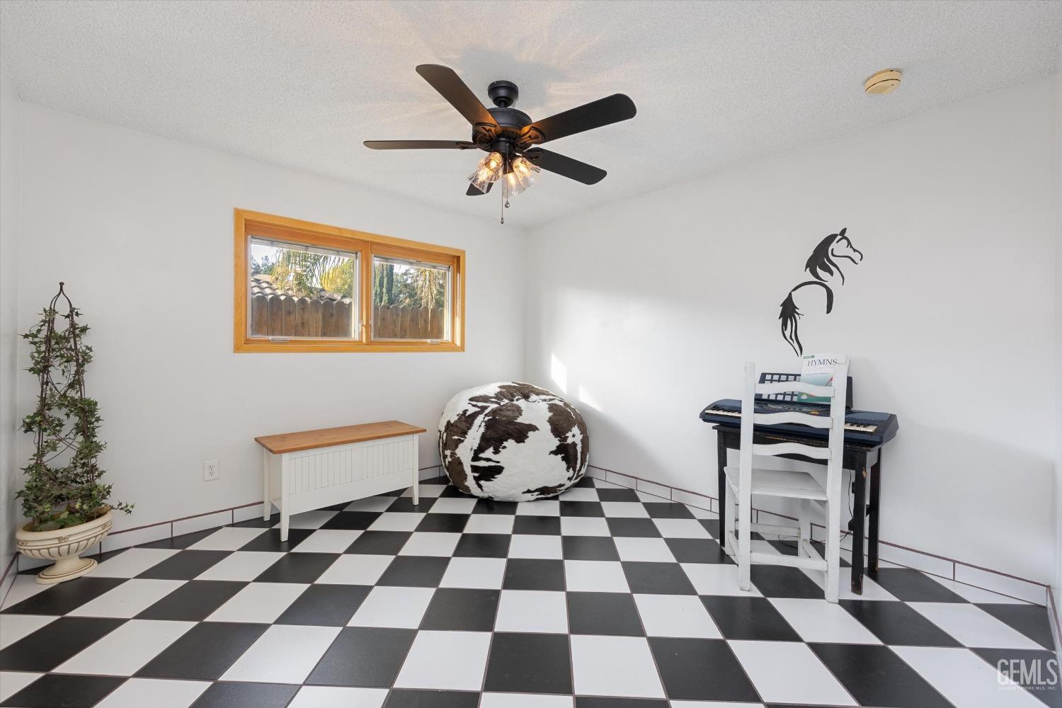 Undisclosed Address Bakersfield, CA 93306 - Photo 30 of 41 a and white cabinets with a black white checkered floor