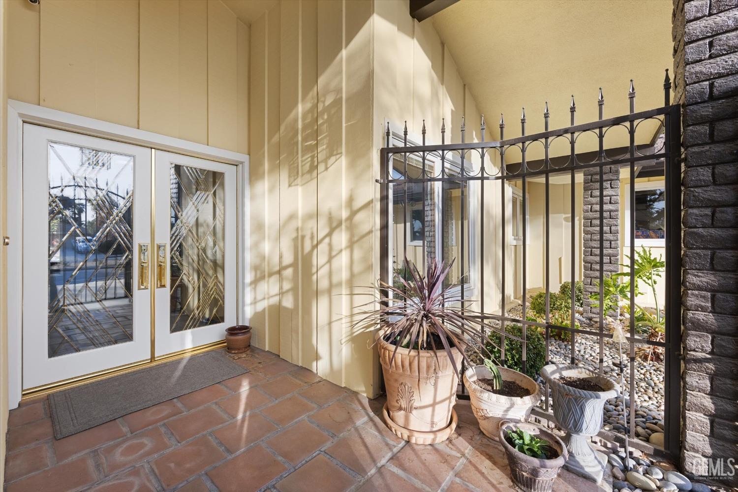 Undisclosed Address Bakersfield, CA 93306 - Photo 6 of 41 a view of balcony with potted plants