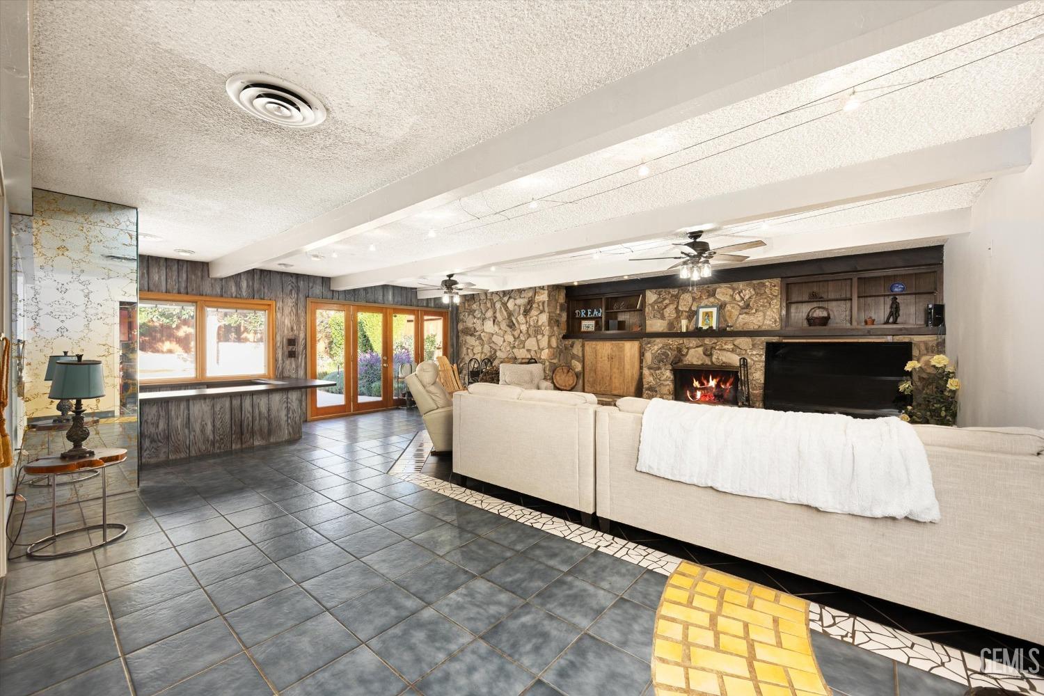 Undisclosed Address Bakersfield, CA 93306 - Photo 9 of 41 a living room with furniture and a large window