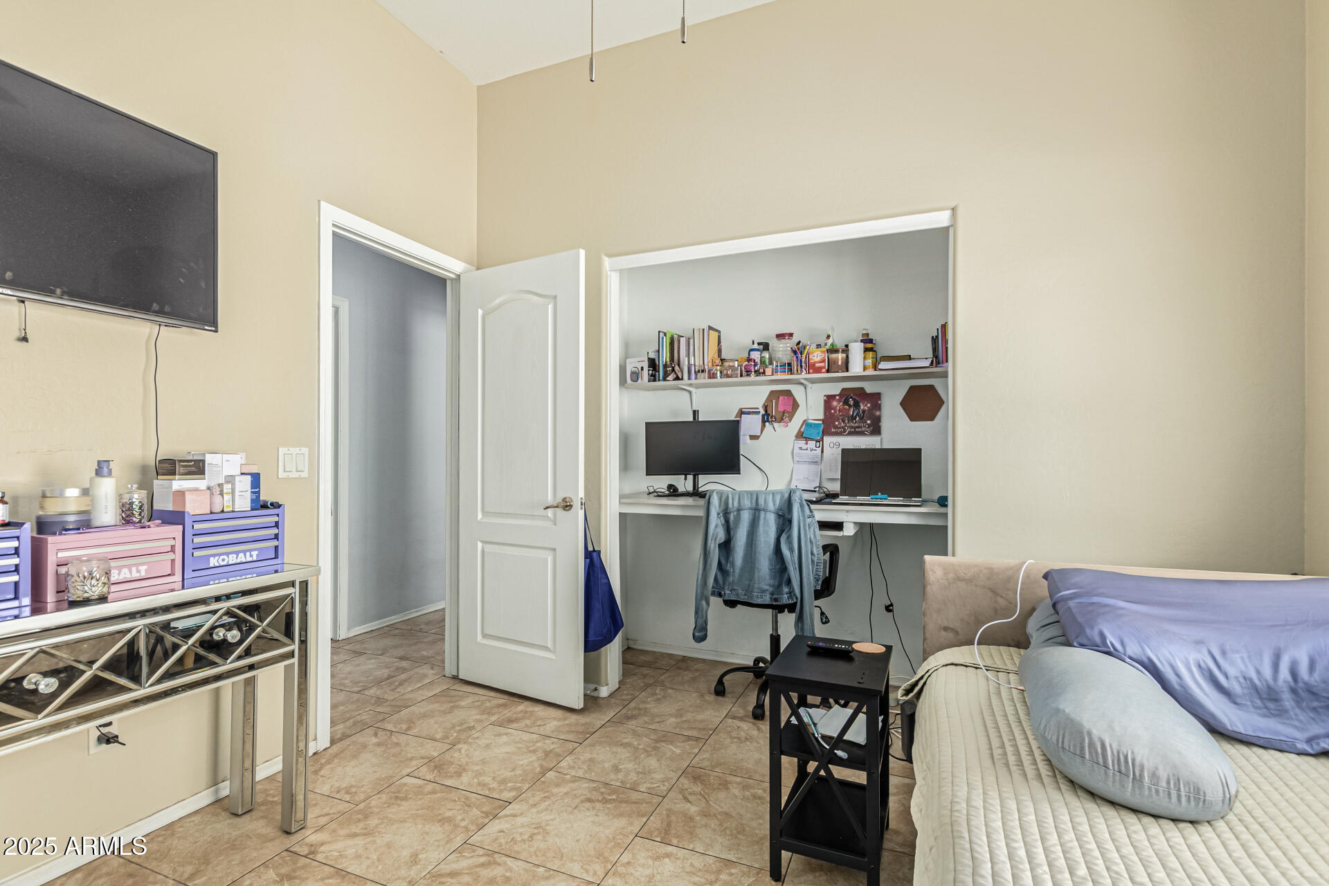 3318 West Latona Road Laveen, AZ 85339 - Photo 16 of 26 a view of a livingroom with workspace and a window