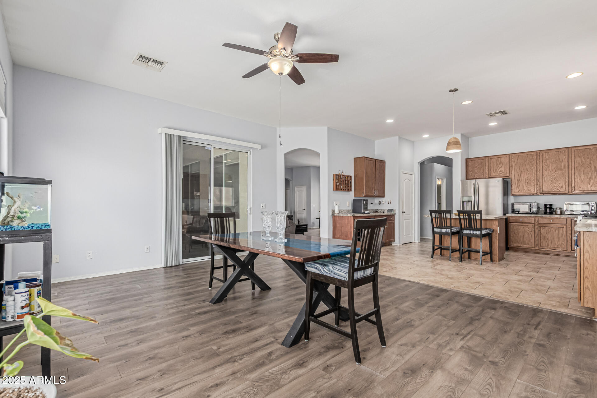 3318 West Latona Road Laveen, AZ 85339 - Photo 6 of 26 a view of a dining room with furniture