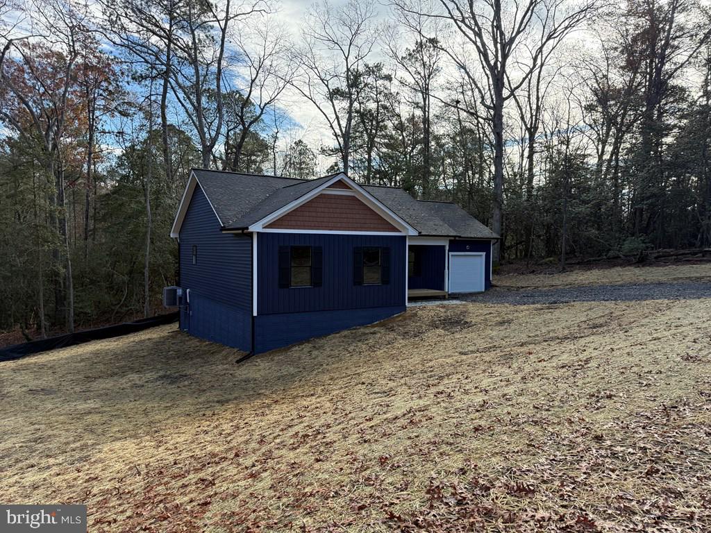 161 Walnut Street Kilmarnock, VA 22482 - Photo 4 of 4 a front view of a house with a yard