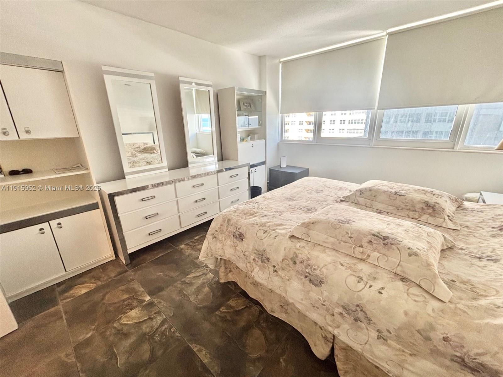 2030 South Ocean Drive, Unit 521 Hallandale Beach, FL 33009 - Photo 11 of 20 a spacious bedroom with a bed and window