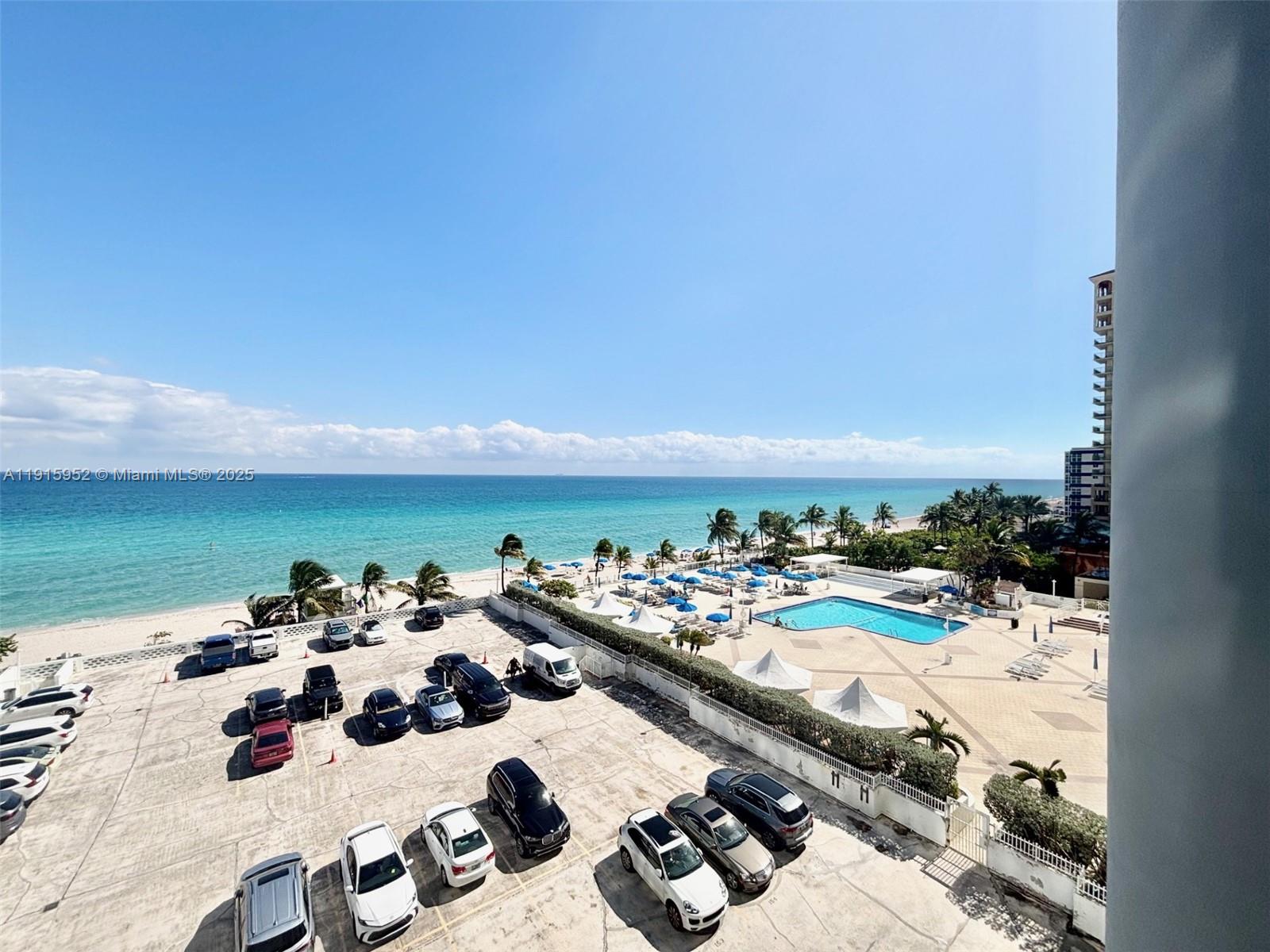 2030 South Ocean Drive, Unit 521 Hallandale Beach, FL 33009 - Photo 2 of 20 a view of a terrace with furniture and garden view