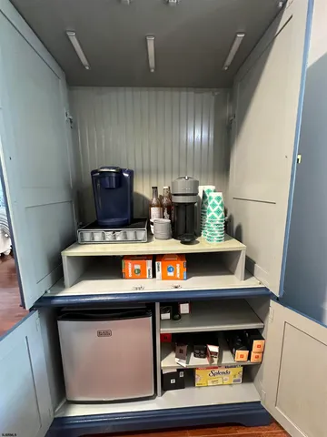 a stove top oven sitting inside of a kitchen
